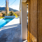 Coconut fiber roll-up shade for swimming pools